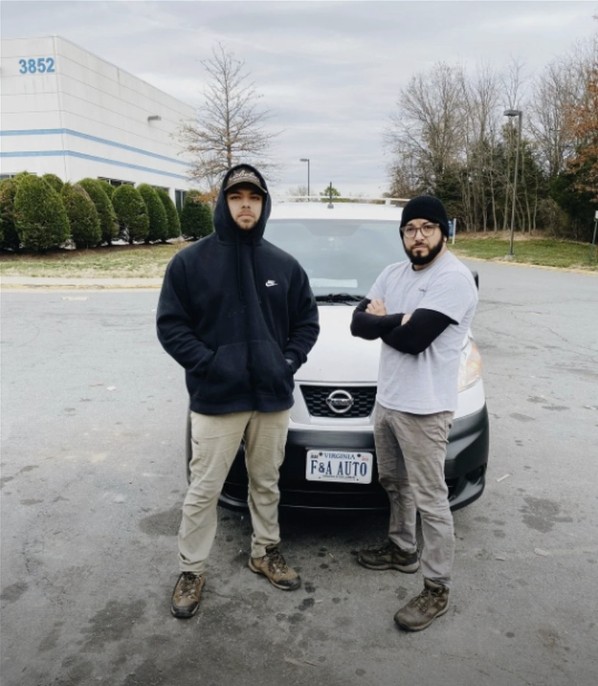 Ariel and Frank, the brothers behind F&A Auto Detail, standing in front of their van